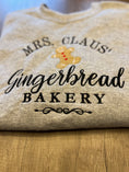 Load image into Gallery viewer, Mrs Claus’ Gingerbread Bakery Christmas Sweatshirt
